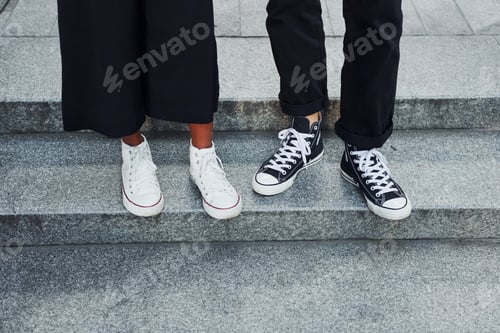 Preview: Close up view. Man with afrian american woman together in the city outdoors