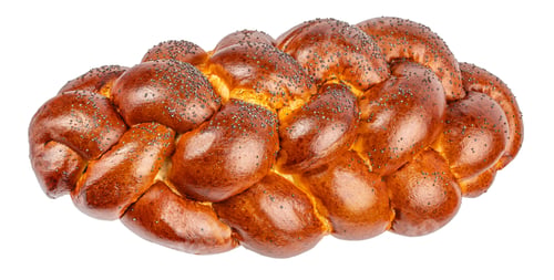 Preview: Golden braided challah bread with poppy seeds isolated
