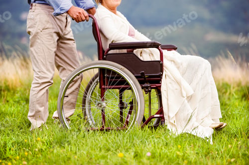 Preview: Man with woman in wheelchair