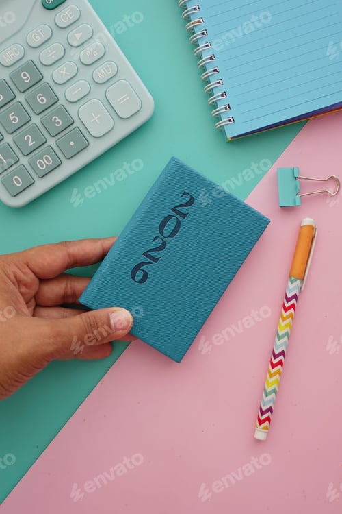 Preview: 2026 goals on a notepad with colorful stationery and office supplies on a desk