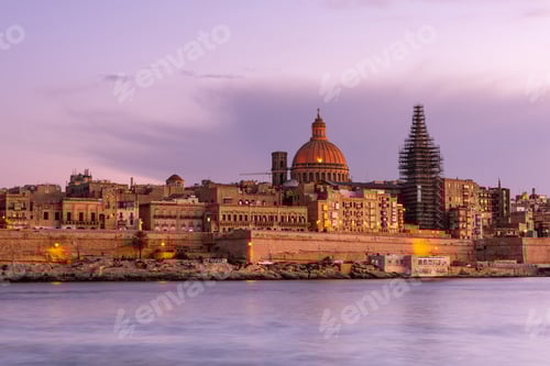 Preview: Illuminated cityscape of Valletta, Malta at sunset