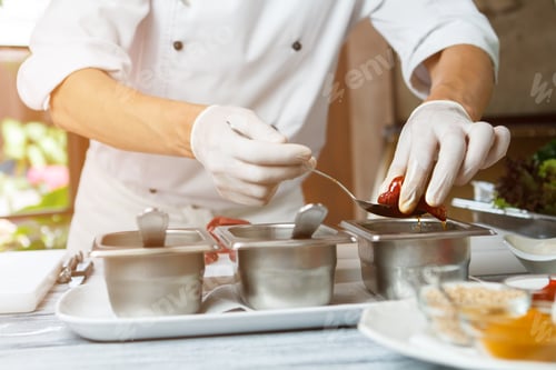 Preview: Hands hold spoon and meat