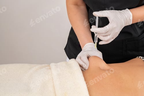 Preview: Mesotherapy of the abdominal area is an injection method in aesthetic cosmetology for body shaping