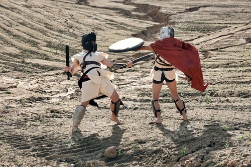 Preview: A Concept Photo Of A Roman Battle Of Two Warriors Of The Colosseum In Action With Aggressive