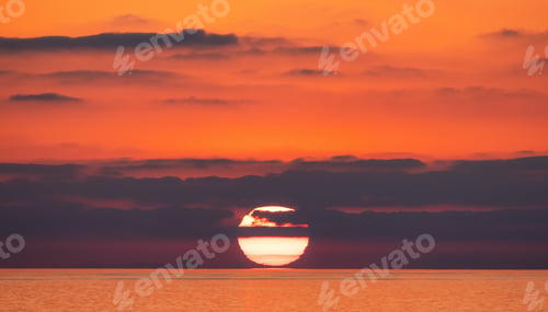 Preview: Dramatic Colorful Sunrise Sky over Tyrrhenian Sea. Abstract Red Sky. Cloudscape Nature Background