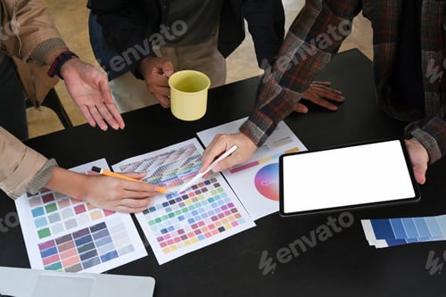 Preview: Group of graphic designer brainstorming and discussing for new project.