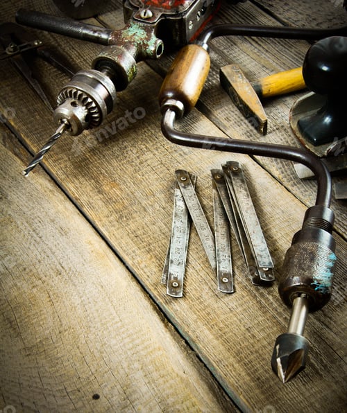 Preview: Various tools on a wooden background.