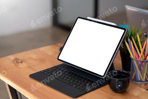 Preview: Blank tablet screen Placed on the table at the office. Mock up.