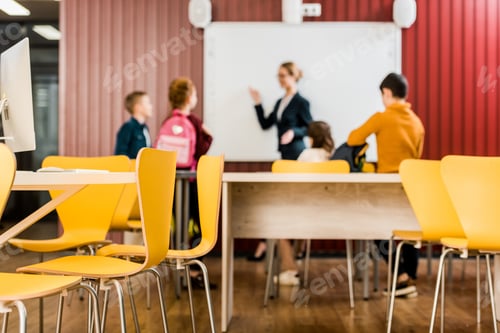 Preview: Students and Teacher in Modern School Classroom