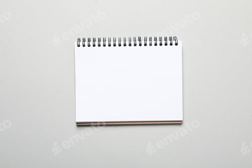 Preview: Blank notebook on light gray background, space for text