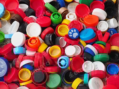 Preview: Coloured bottle caps prepared for recycling, plastic waste