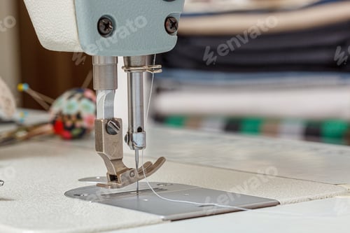 Preview: Sewing machine needle with thread and fabric