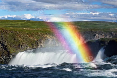 Preview: Godafoss waterfall and rainbow on a sunny day