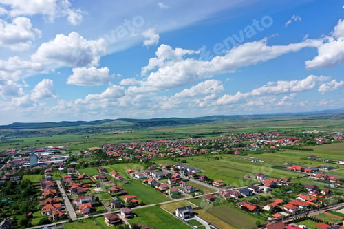 Preview: Aerial view of residential neighborhood, village houses in a plain