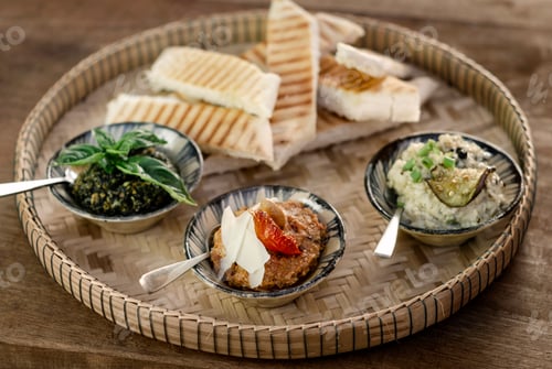 Preview: turkish meze vegetarian tapas snack platter on rustic wood table