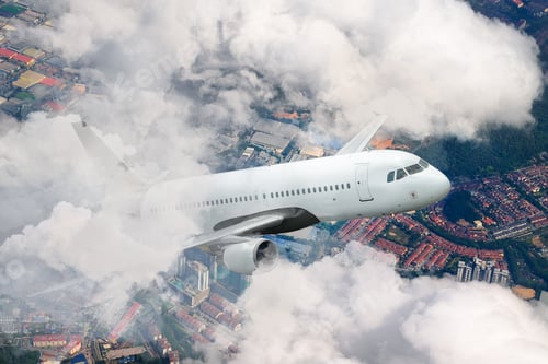 Preview: Airplane above the city.