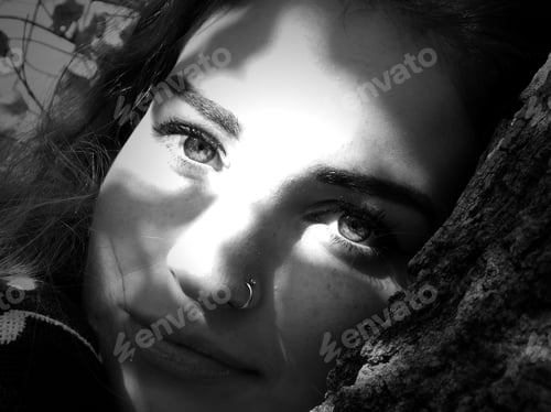 Preview: Beautiful Young Woman with Shadows on Her Face