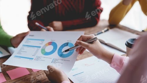 Preview: Business people meeting explaining the financial graph data and marketing plan.