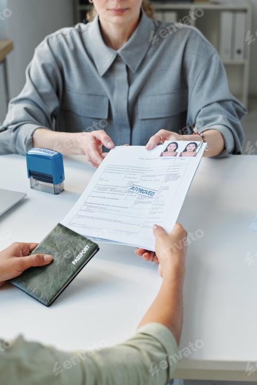 Preview: Consular Officer Giving Documents Back