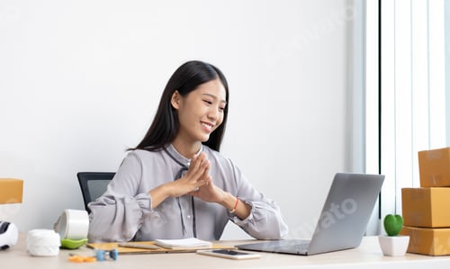 Preview: Smiling Young Woman Working From Home Office