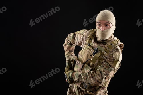 Preview: front view young soldier in uniform with gun black background israel tank warriors