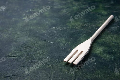 Preview: front view white plastic fork on dark background plastic fork cutlery wood food darkness knife