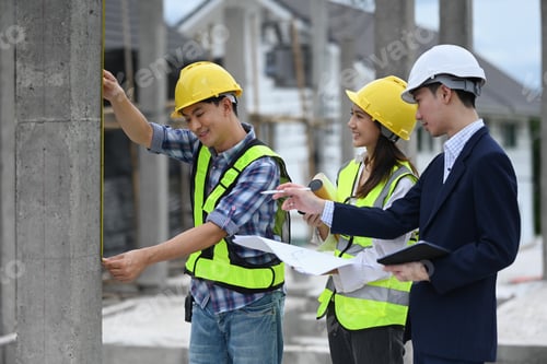 Preview: Team of engineer and architects discussing about new project plan at construction site