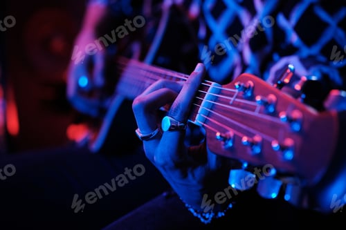 Preview: Unrecognizable Man Playing Guitar