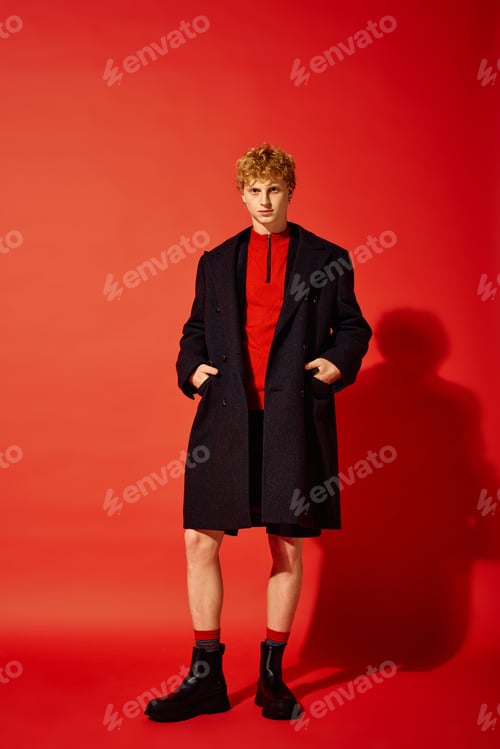 Preview: Fashion forward holiday attire showcased by a man in a vibrant setting in Christmas 2025