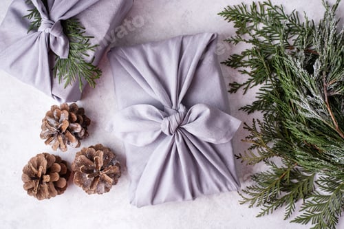 Preview: Zero waste concept, Christmas wrapped gift by linen fabric.