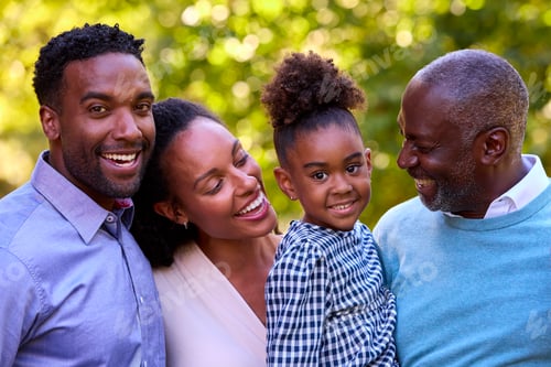Preview: Portrait Of Multi-Generation Family Enjoying Walk In Countryside Together
