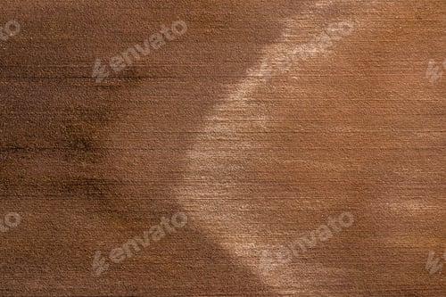 Preview: Aerial view of a wheat field after harvest. Top view.