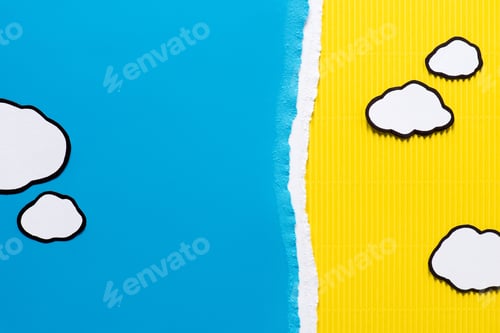 Preview: top view of paper clouds on blue and yellow paper background