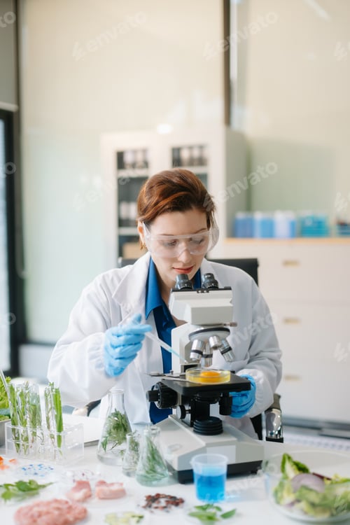 Preview: Scientist in a modern lab analyzing food samples with advanced equipment. Perfect for food science,