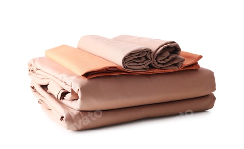 Preview: Stack of clean bed sheets isolated on white