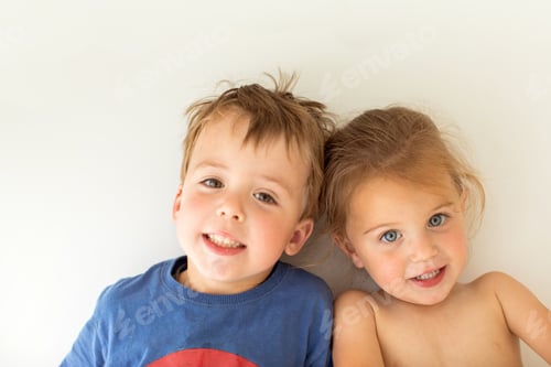 Preview: Cute siblings looking at camera
