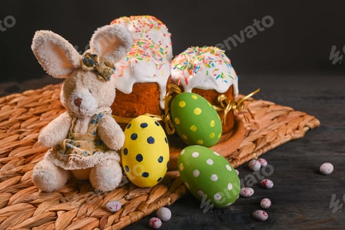 Preview: Easter cake and eggs on light wooden table