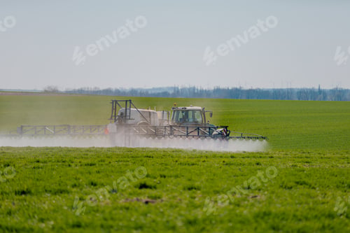 Preview: Tractor Spraying Herbicides on Field Agriculture