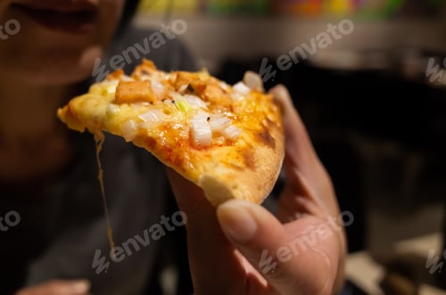 Preview: Eat Small Piece Of Pizza At A Restaurant