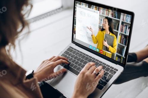 Preview: Woman Attends Online Class at Home on Laptop