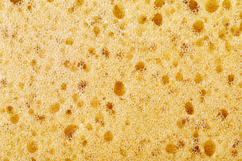 Preview: Yellow sponge close-up showing porous absorbent texture