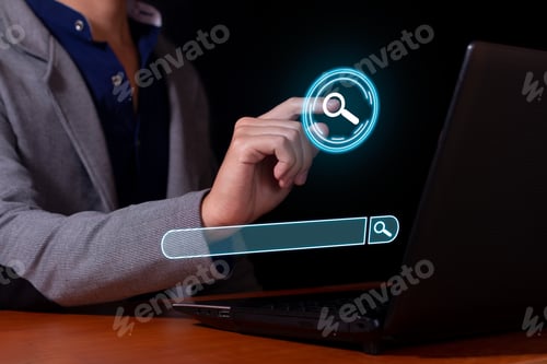Preview: Man typing in a search engine, surfing the Internet and looking for information.