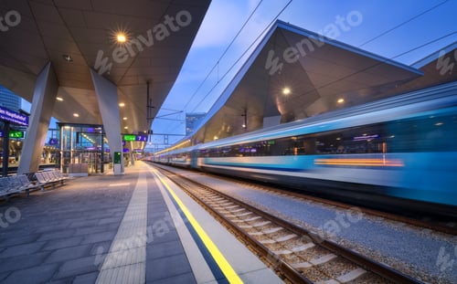 Preview: High speed train in motion on the railway station at night