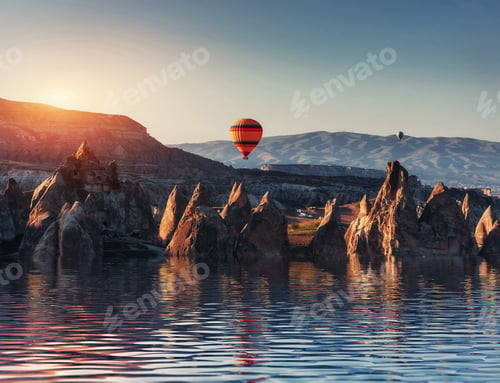 Preview: Composition of balloons over water and valleys, gorges, hills, b
