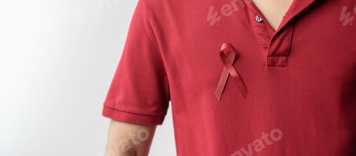Preview: Person Wearing Red Ribbon for Health Awareness