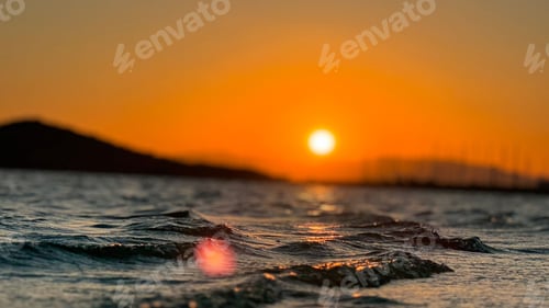 Preview: Sunset ocean waves and vibrant sky