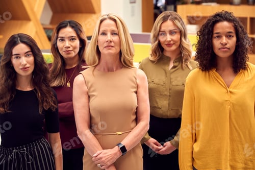 Preview: Portrait Of Multi-Cultural Female Business Team Standing In Modern Open Plan Office