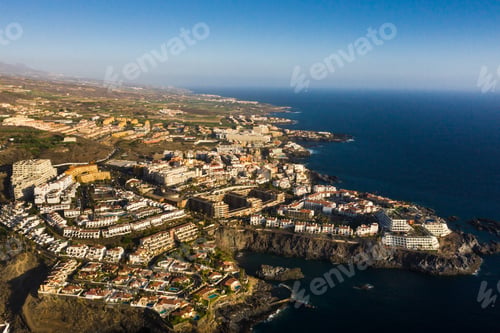 Preview: Top view of the houses located on the rock of Los Gigantes at sunset, Tenerife, Canary Islands
