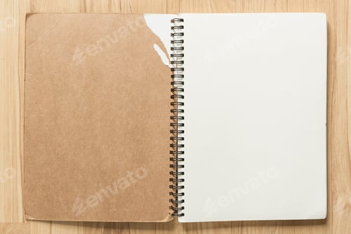 Preview: Open notebook on wood background. Empty page background for design with copy space for text.