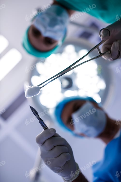 Preview: Surgeons performing operation in operation theater
